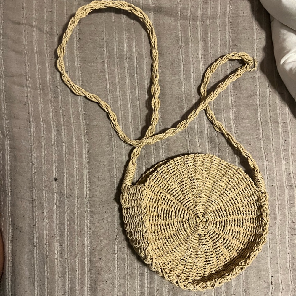 Summer Light Woven circle bag from Urban Outfitters with strap